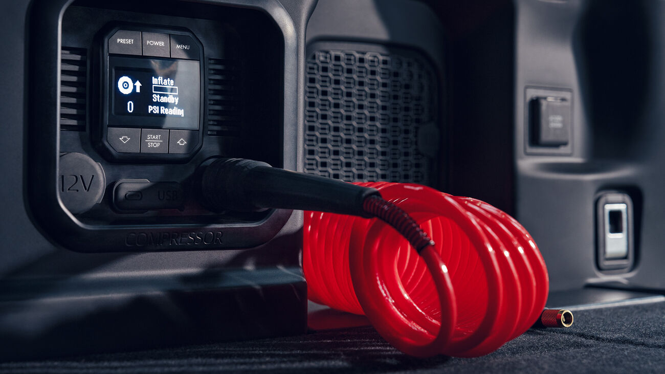 Toyota 4Runner i-FORCE MAX with its onboard air compressor allowing for users to inflate tires and other inflatables.c