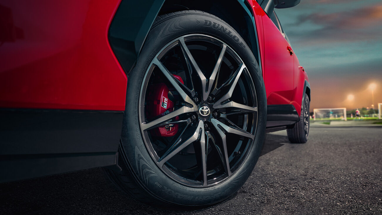 RAV4 Plug-in Hybrid GR Sport in Supersonic Red with Midnight Black Metallic roof&rsquo;s 20-in. wheels.
