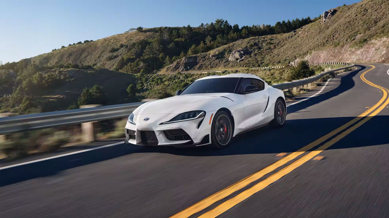 GR Supra 3.0 Premium in Absolute Zero cruising down a costal road 