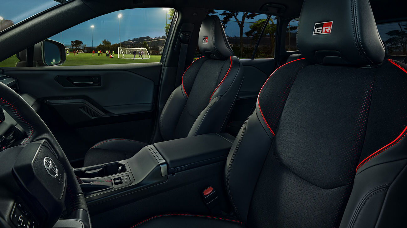 RAV4 Plug-in Hybrid GR Sport&rsquo;s modern interior cabin with Black SofTex&reg; and BRIN&bull;NAUB&reg; synthetic suede trim